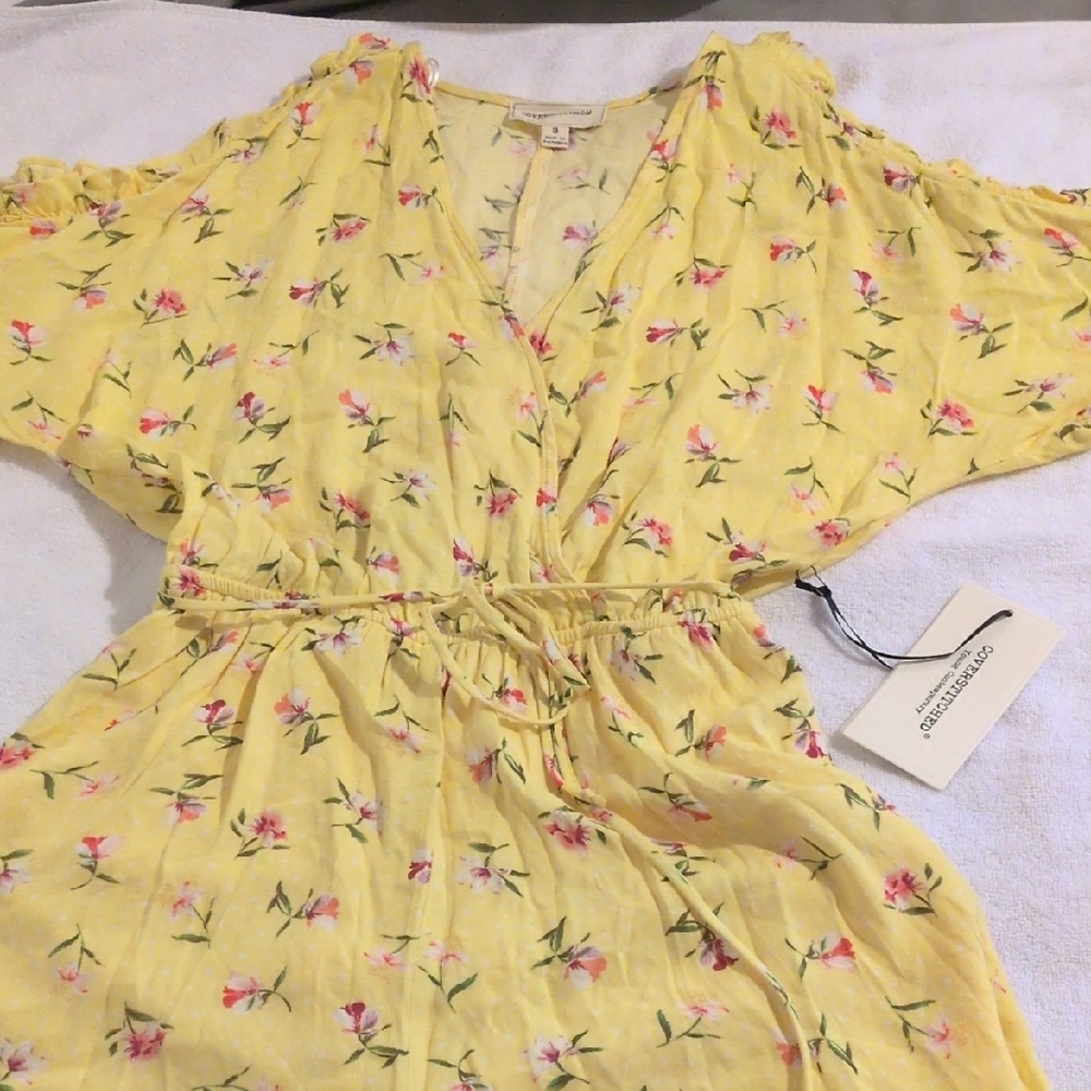 Yellow Floral Romper with Pink Accents